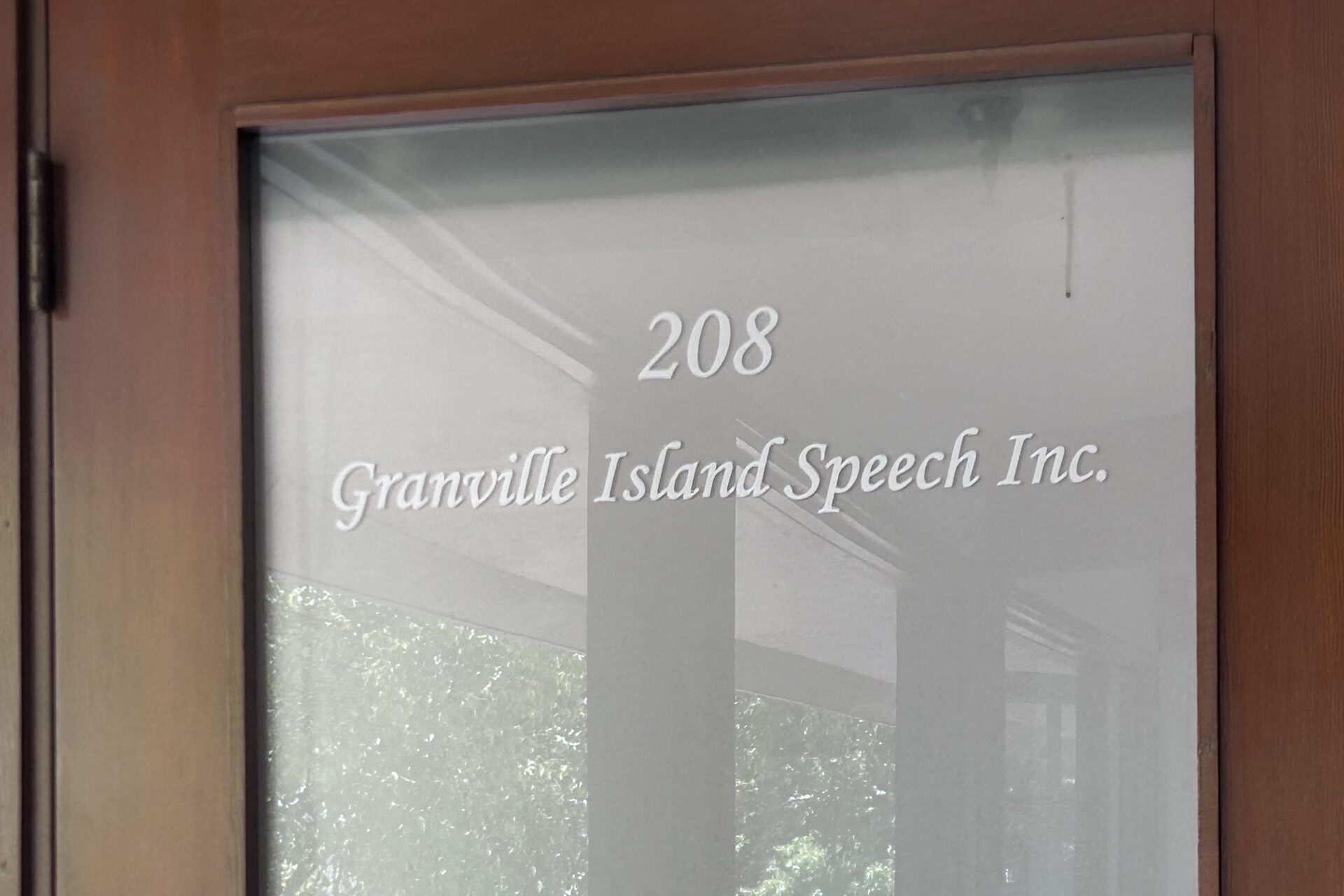 A photo of the front door of the Granville Island Speech clinic.