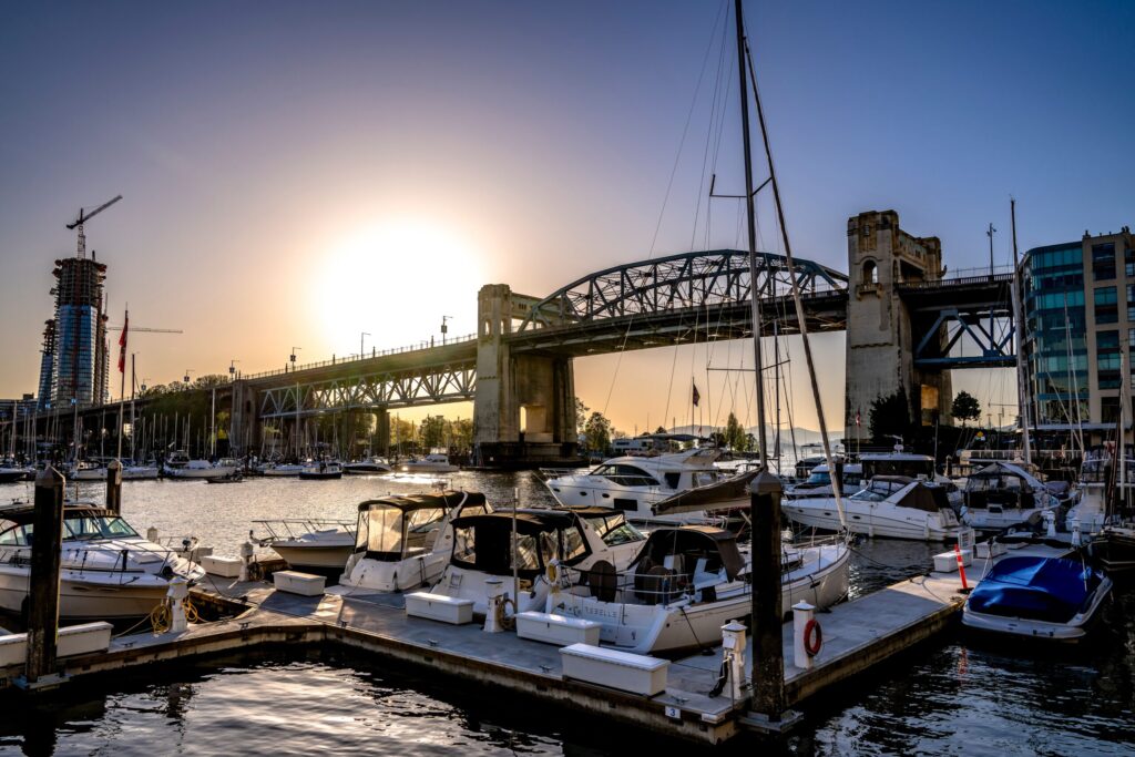 A photo of the boats and bridge at Granville Island. 
